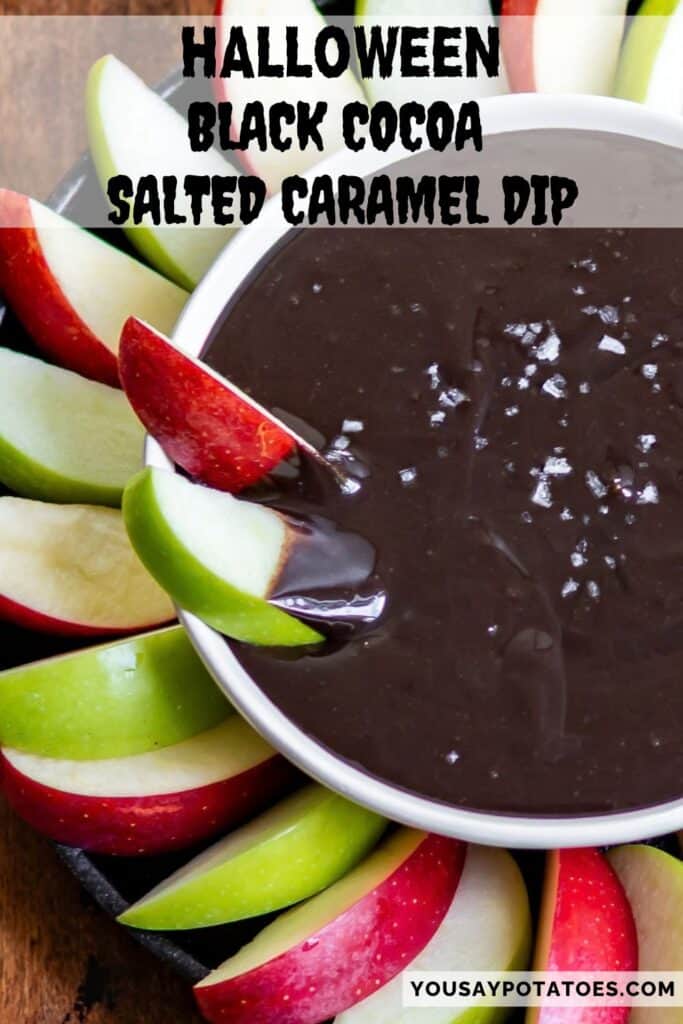 Apple slices in dip, with text: Halloween Black Cocoa Salted Caramel Dip.